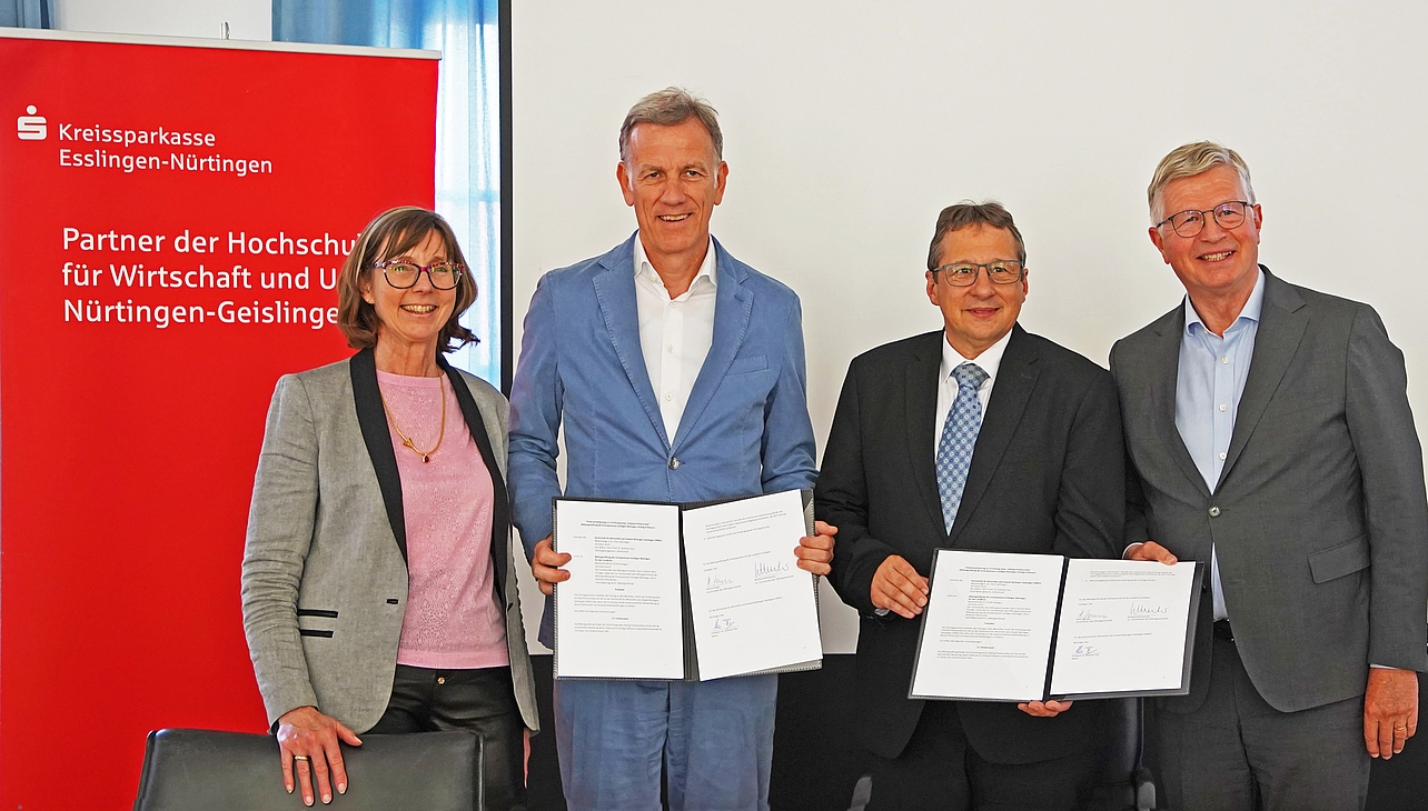 Prof. Dr. Iris Ramme (NGU Director of International University Affairs), KSK Chairman of the Board Burkard Wittmacher, Rector Prof. Dr. Andreas Frey and County Commissioner (Landrat) Heinz Eininger (from left) after signing the contract.