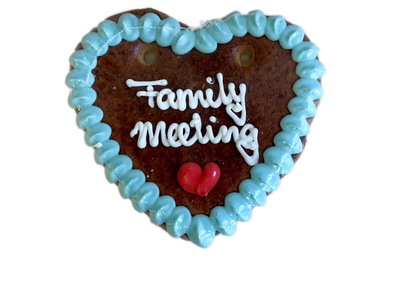 Lebkuchenherz mit Aufschrift Family Meeting